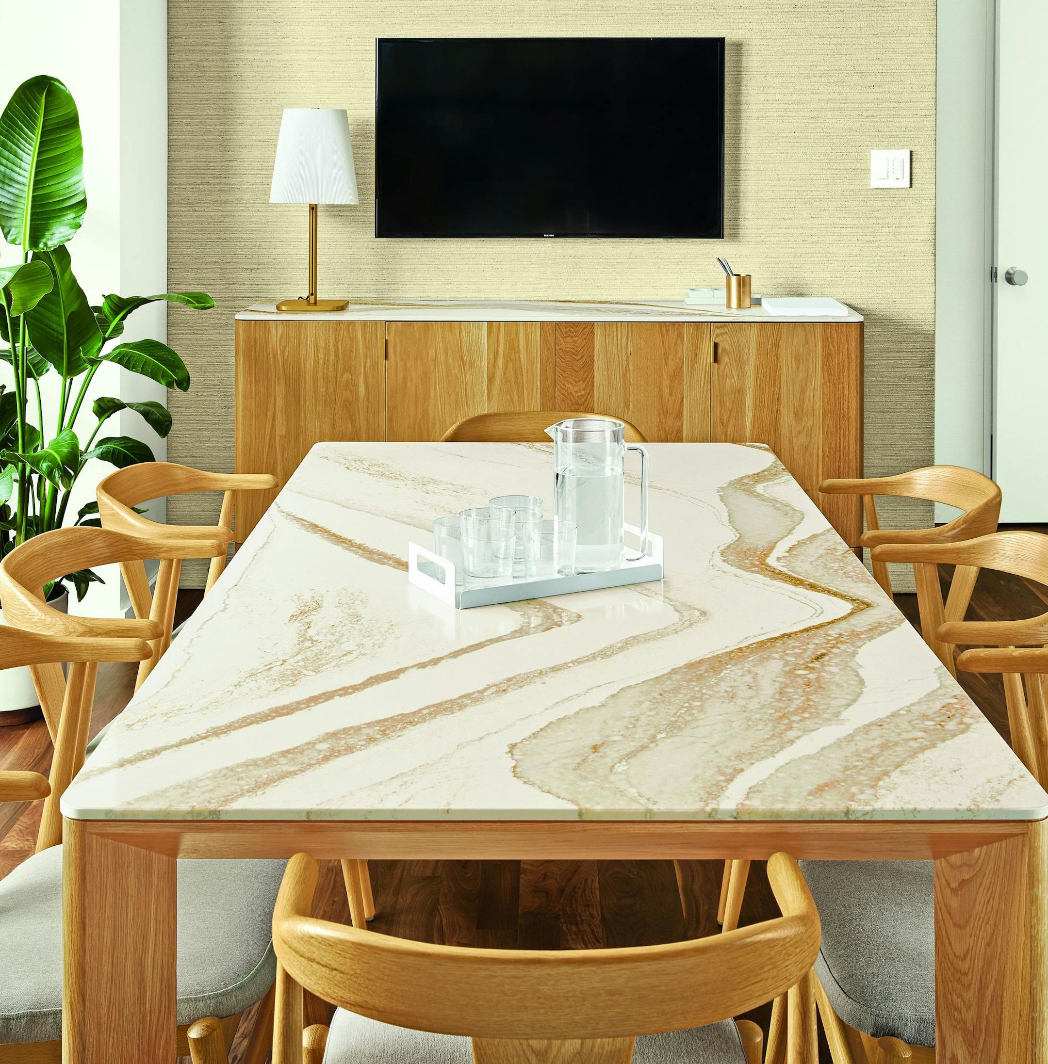 A dining table from the Pren Collection by Room & Board and Cambria.