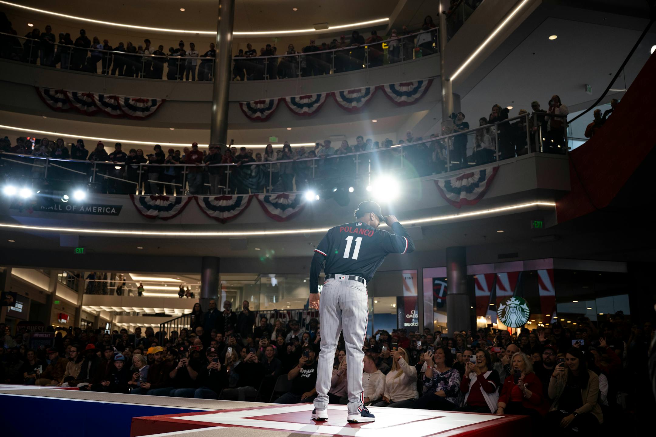 Minnesota Twins second baseman Jorge Polanco (11) models a new jersey.
