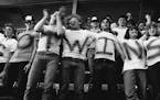 Fans from Marshall, Minn., cheer on opening day of the Minnesota Twins baseball team in the Metrodome on April 3, 1984. (Neil McGahee/Star Tribune)