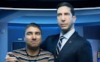NBC launches its Peacock service with "Intelligence," a comedy starring David Schwimmer, right, and creator Nick Mohammed.