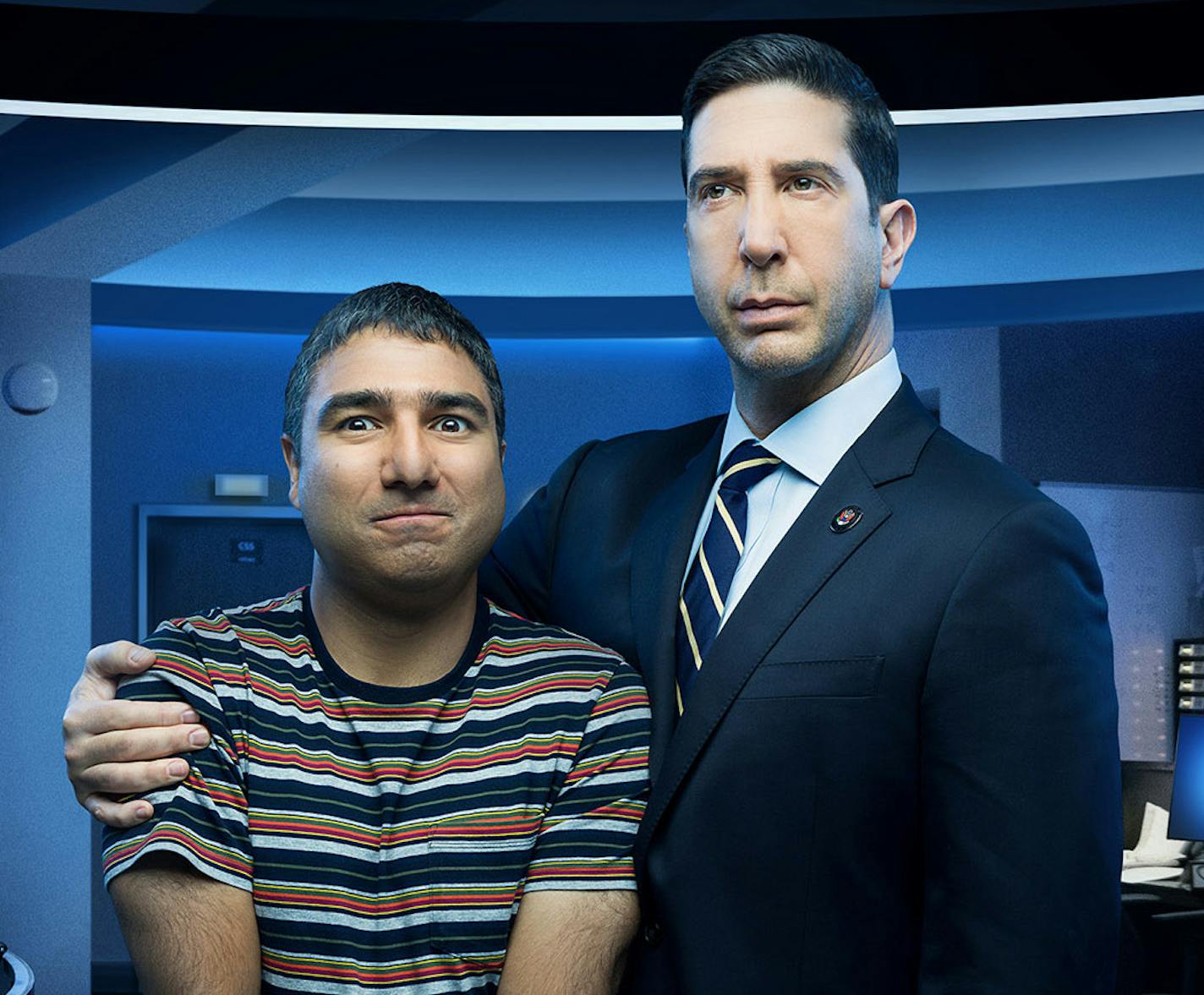 NBC launches its Peacock service with "Intelligence," a comedy starring David Schwimmer, right, and creator Nick Mohammed.