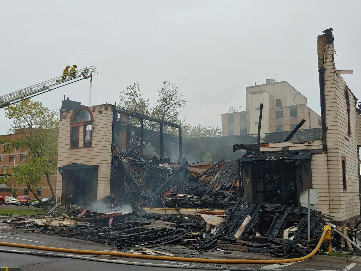 An overnight fire engulfed and destroyed a synagogue in downtown Duluth and continued to burn many hours later Monday morning, Sept. 9, 2019. Photo: Brooks Johnson