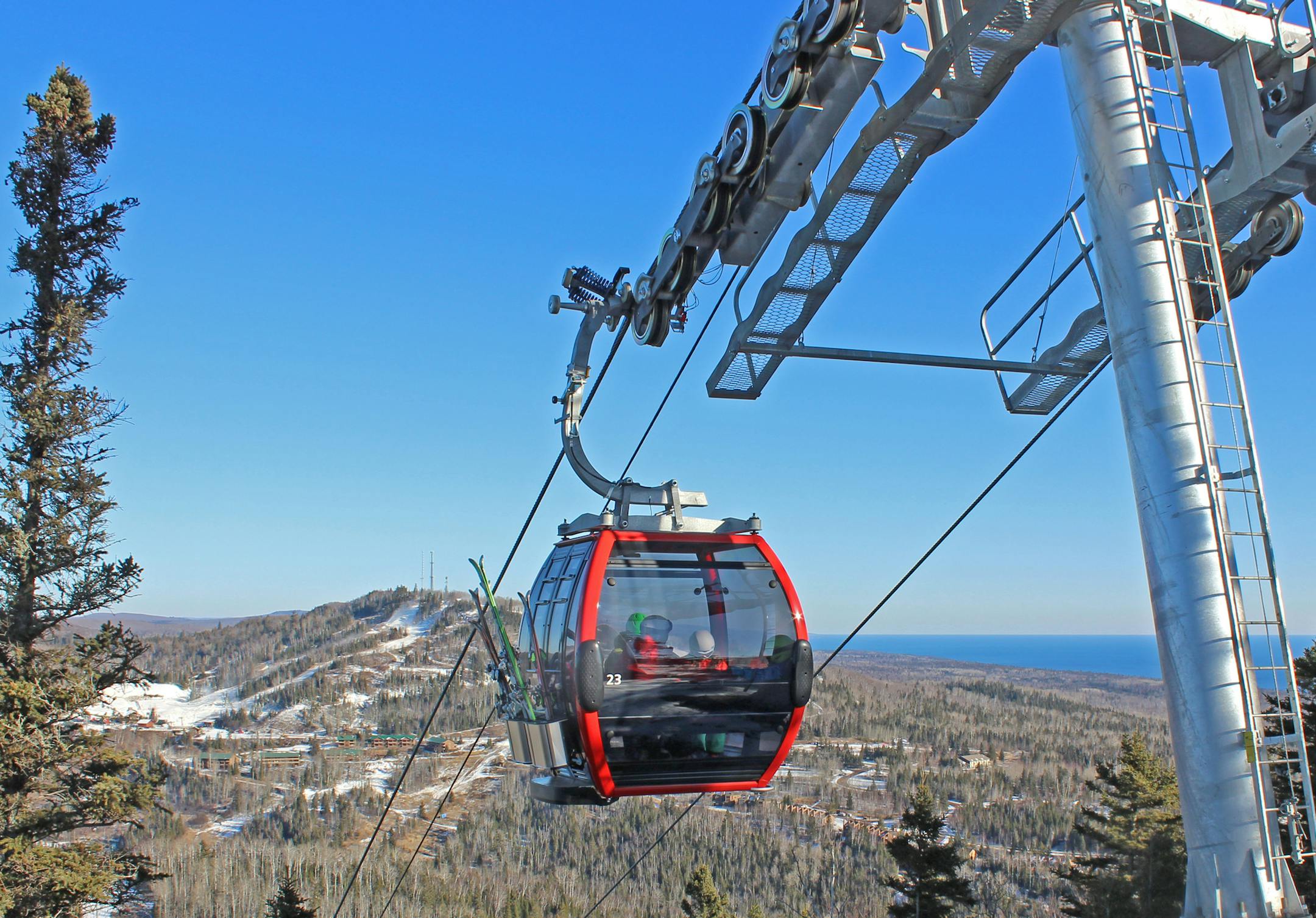 im Vick just sent through this photo. Doesn't this look sleek? I'll miss those little red ones, but this looks pretty awesome, too. I couldn't figure out how to smoothly work it into the story, but they'll slow down the gondola speed during the warm seasons when riders want to soak in the scenery more than get up the mountain quickly.