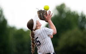 Champlin Park's Reese Reimler catches a fly ball during the Class 4A, Section 5 championship game.