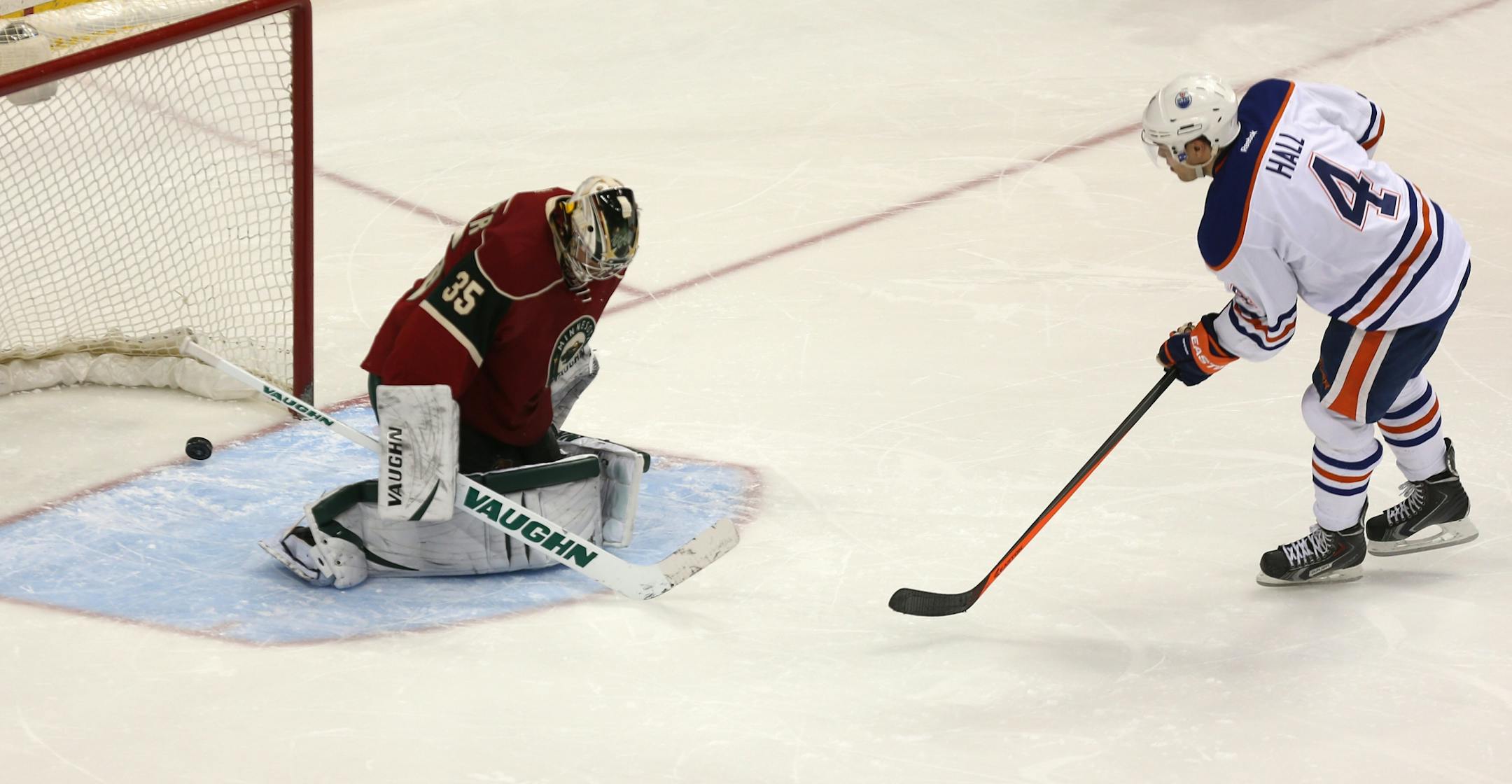 The puck trickled in the net behind the Wild's goalie Darcy Kuemper as Edmonton's Taylor Hall scored the shoot out goal to win.