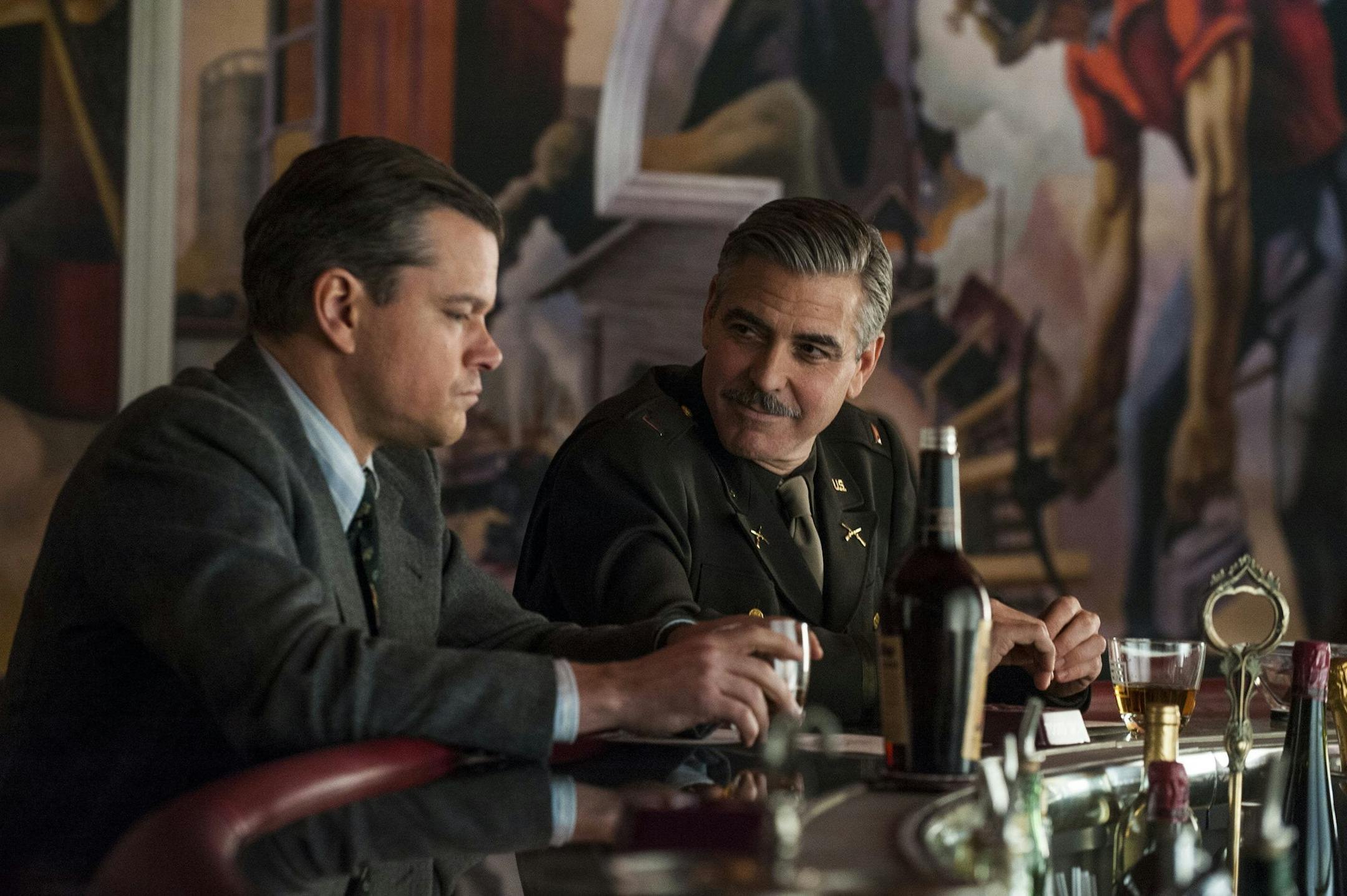 Actor Matt Damon, left, and actor/director George Clooney peform a scene on the set of the Columbia Pictures' movie, "The Monuments Men". (Columbia Pictures/MCT) ORG XMIT: 1148636 ORG XMIT: MIN1402032302420937