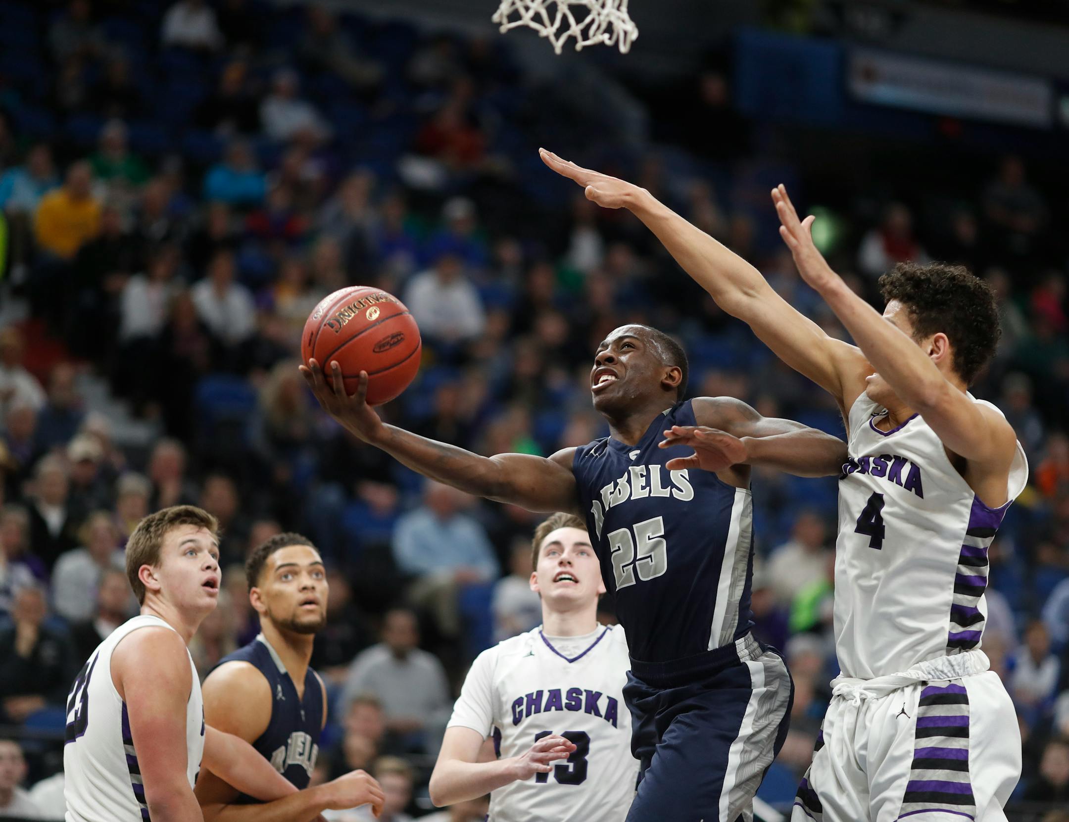 Champlin Park's McKinley Wright (25) was named Minnesota's Mr. Basketball on Sunday.