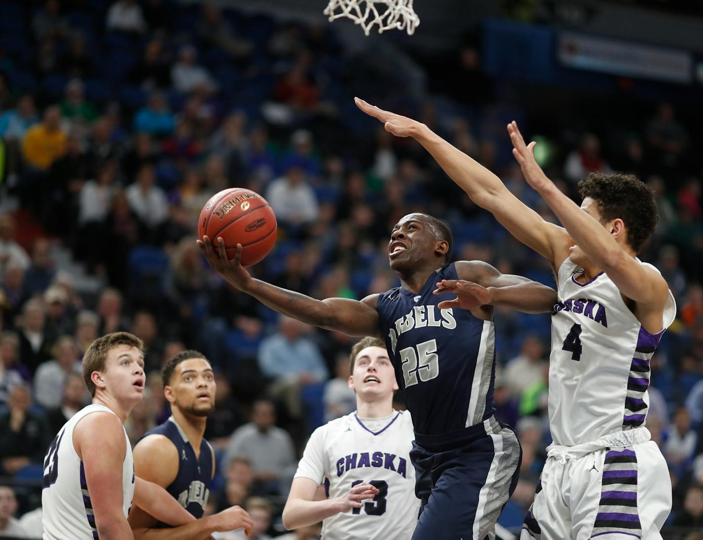 Champlin Park's McKinley Wright (25) was named Minnesota's Mr. Basketball on Sunday.