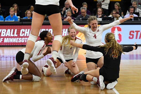 Stanford celebrated after defeating Nebraska 3-2 in the NCAA Division 1 Volleyball Championship match on Saturday, Dec. 15, 2018 at Target Center in M