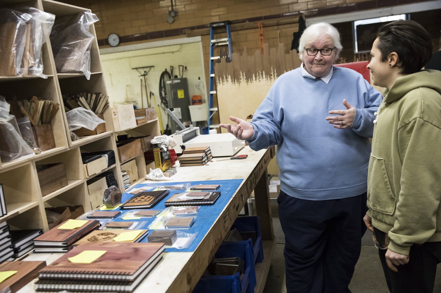 Liz Mattern chatted with Woodchuck employee Angela Sauro at the former RyKrisp building that is now a workplace for 120 mostly millennial workers. Mattern worked at RyKrisp for 35 years. They are in what was formerly where the ovens were.