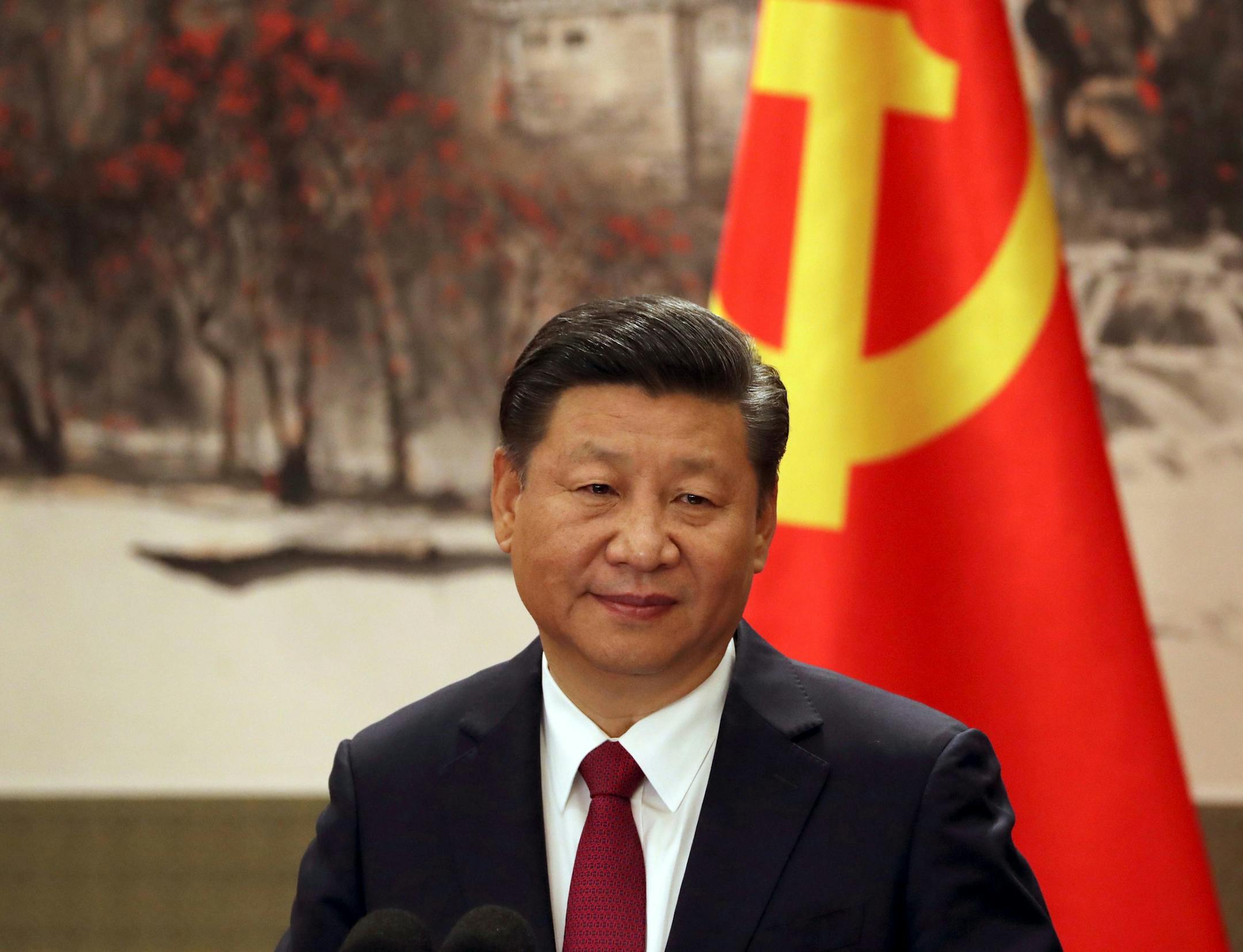Chinese President Xi Jinping, one of the seven newly elected members of the Politburo Standing Committee, attends a press event at Beijing's Great Hall of the People on Wednesday, Oct. 25, 2017. The seven-member Standing Committee, the inner circle of Chinese political power, was paraded in front of assembled media on the first day following the end of the 19th Communist Party Congress.(AP Photo/Ng Han Guan) ORG XMIT: XHG316