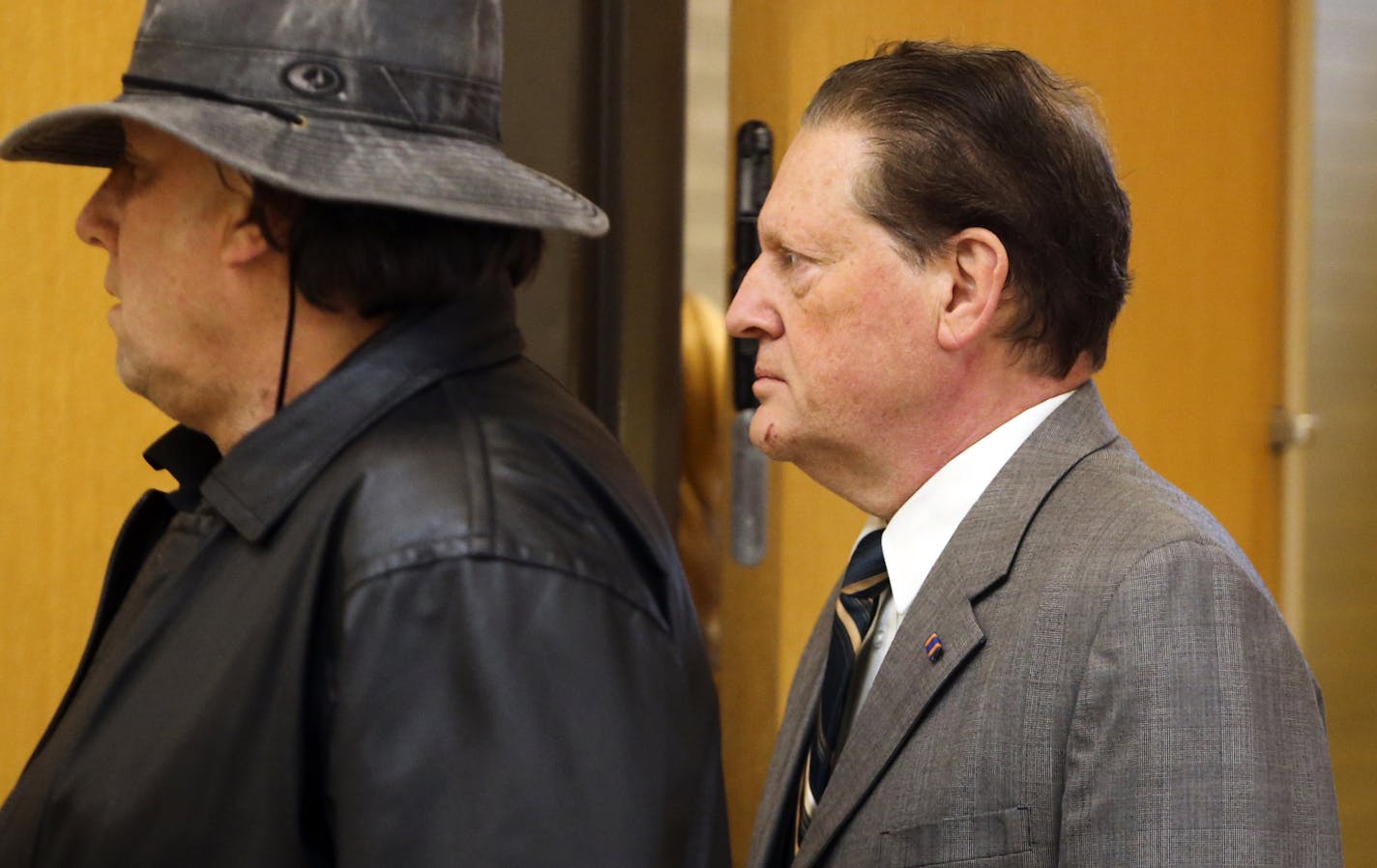 Byron Smith, right, arrives at the courthouse with an unidentified man before the start of Tuesday's trial for Smith for the murders of 17-year-old Nick Brady and 18-year-old Haile Kifer at the Morrison County Courthouse in Little Falls Tuesday, April 29, 2014. ](DAVID JOLES/STARTRIBUNE) djoles@startribunemurders The murder trial of Byron Smith in the deaths of 17-year-old Nick Brady and 18-year-old Haile Kifer at the Morrison County Courthouse in Little Falls Tueday, April 29, 2014.