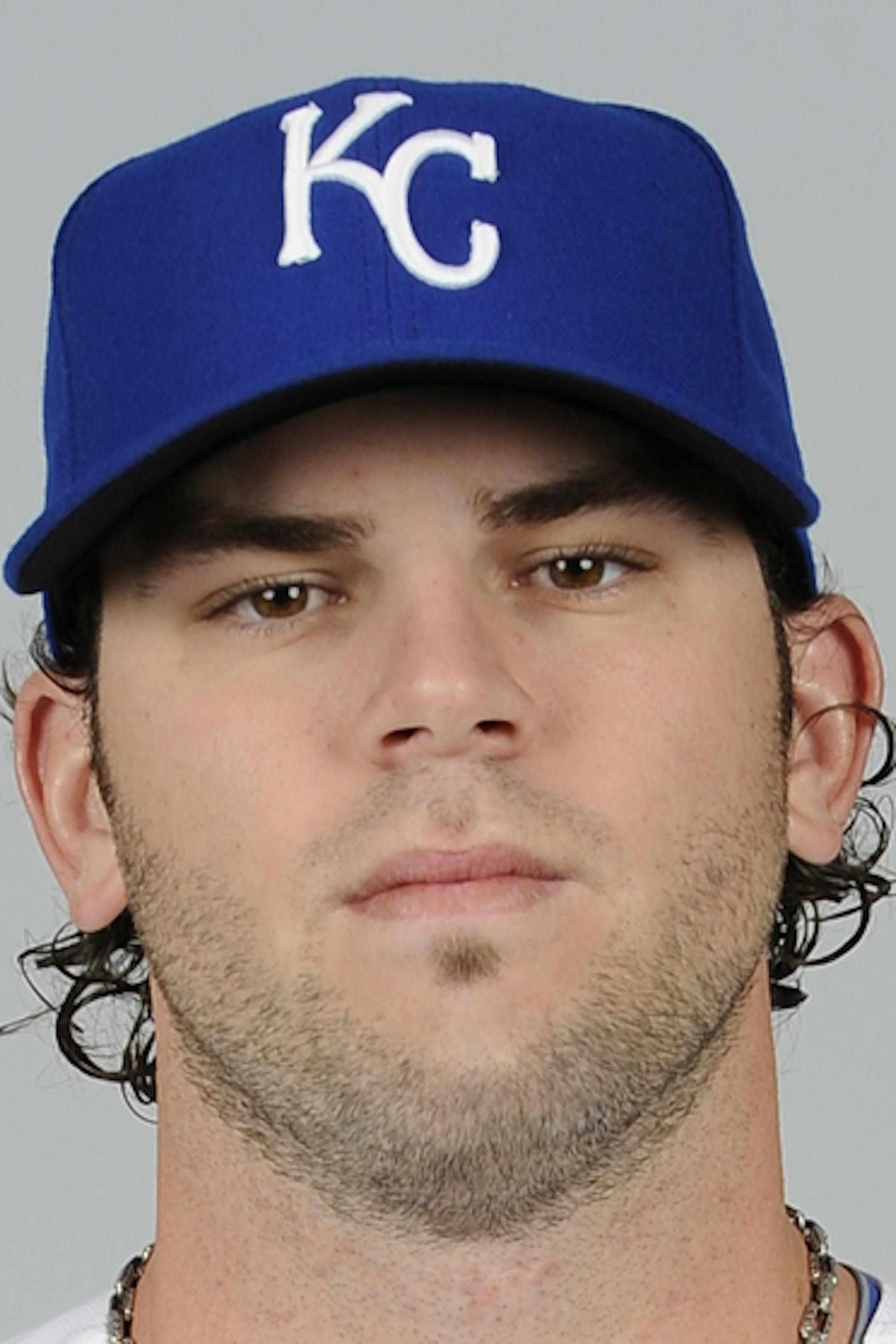SURPRISE, AZ - FEBRUARY 21: Mike Moustakas #8 of the Kansas City Royals poses during Photo Day on Thursday, February 21, 2013 at Surprise Stadium in Surprise, Arizona. (Photo by Chris Bernacchi/MLB Photos via Getty Images) *** Local Caption *** Mike Moustakas ORG XMIT: 159449626