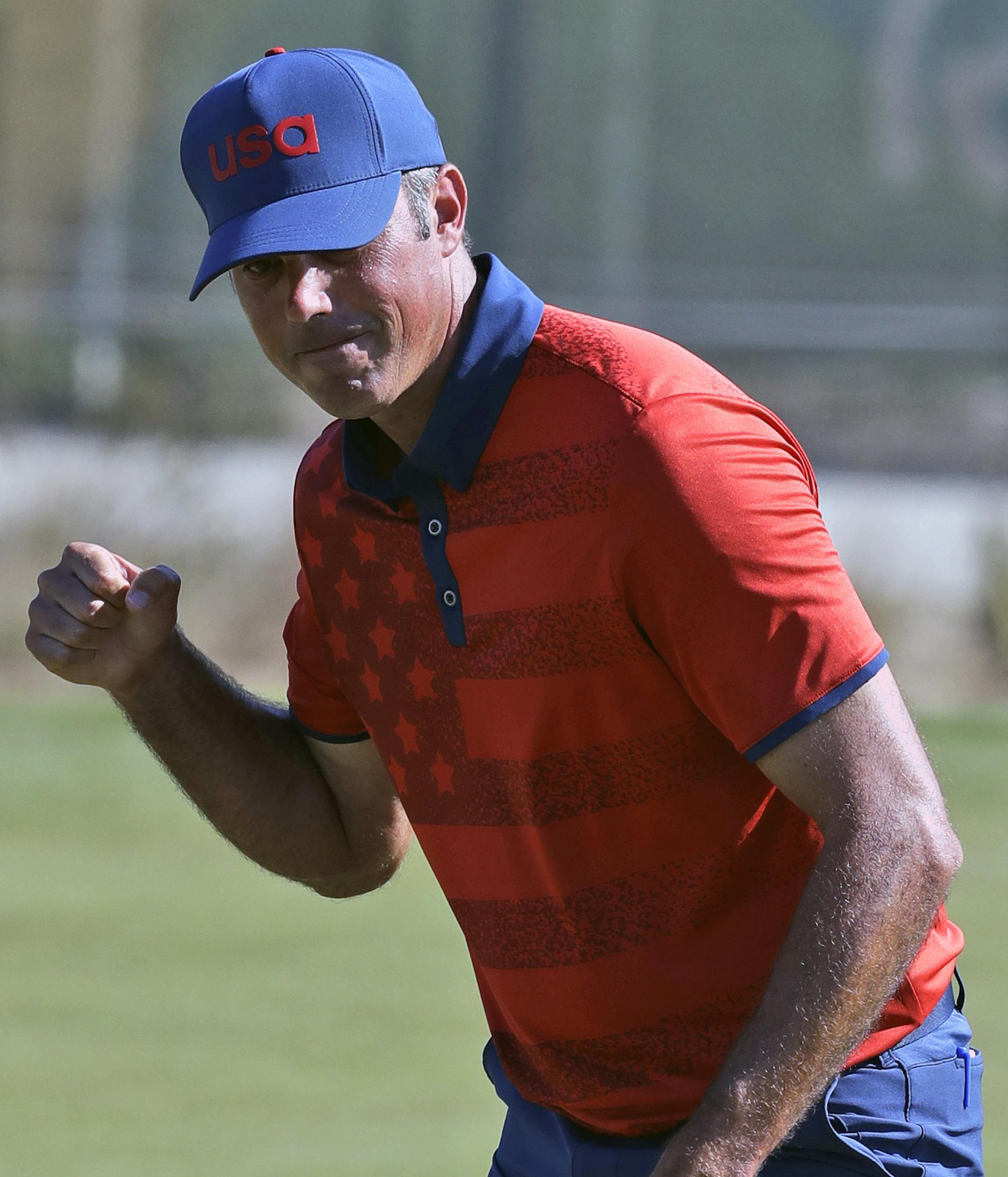 Matt Kuchar of the United States, birdies the 15th hole during the final round of the men's golf event at the 2016 Summer Olympics in Rio de Janeiro, Brazil, Sunday, Aug. 14, 2016. (AP Photo/Chris Carlson) ORG XMIT: OGLF200