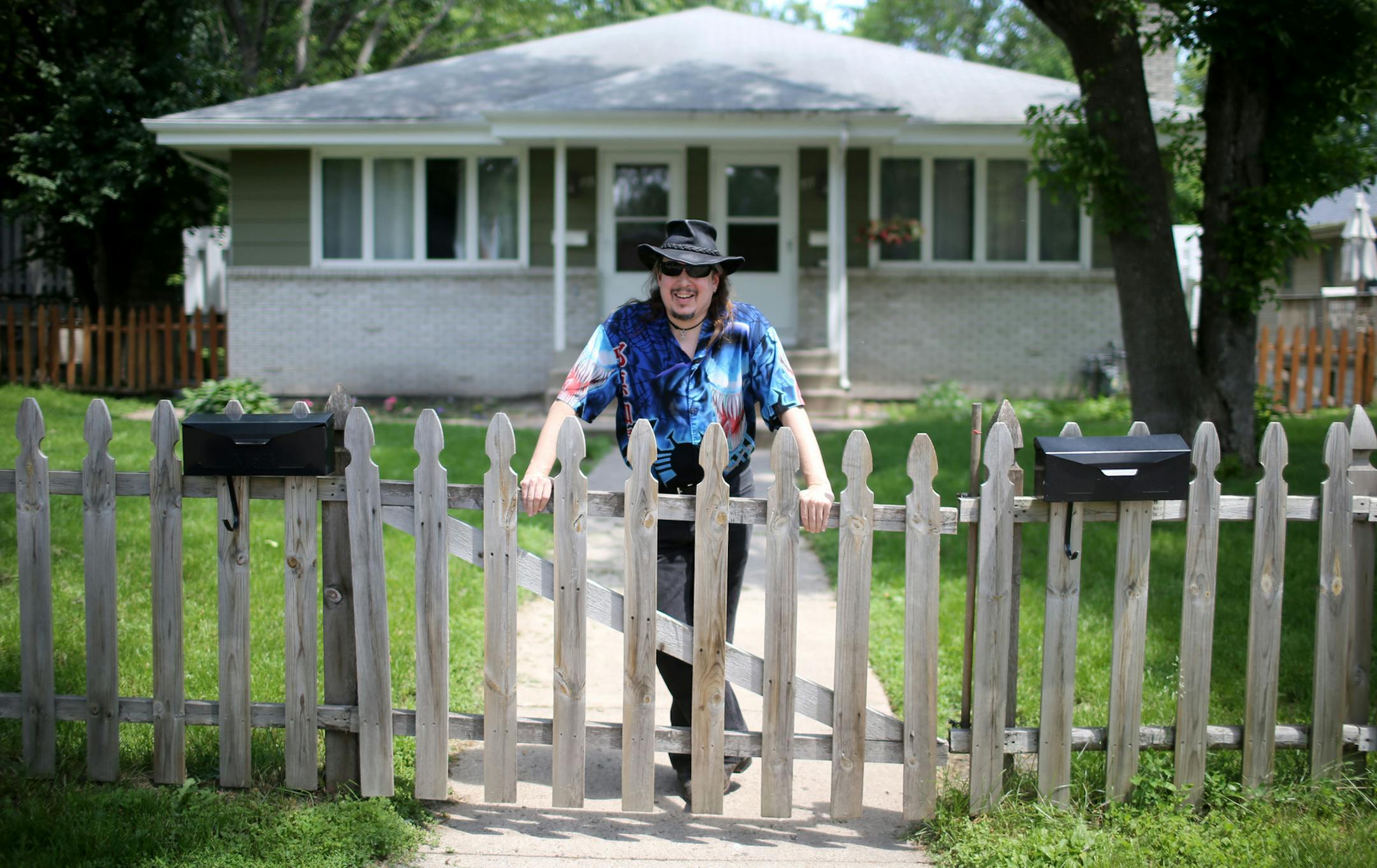 Gypsy Rogers outside the duplex he owns Tuesday, June 9, 2015, in Hopkins, MN. Rogers believes the city is guilty of extortion and out of principle he has hired an attorney and is suing, even though he knows he will lose money on the case. ](DAVID JOLES/STARTRIBUNE)djoles@startribune.com Gypsy Rogers programs computers for a living and breathes fire at Renaissance festivals for fun. He says his major talent is "pissing people off." But these days, Rogers is the unhappy one. He claims the city of