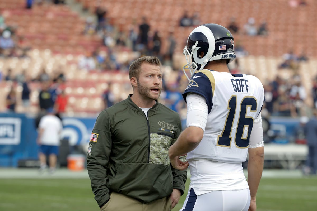 Los Angeles Rams head coach Sean McVay talks to quarterback Jared Goff earlier this season. The duo has LA among the top teams in the NFL.