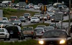 Jim Gehrz/Minneapolis Star Tribune Traffic slows to a crawl along Highway 10 in Anoka during the afternoon commute. This scene shows traffic on Highwa
