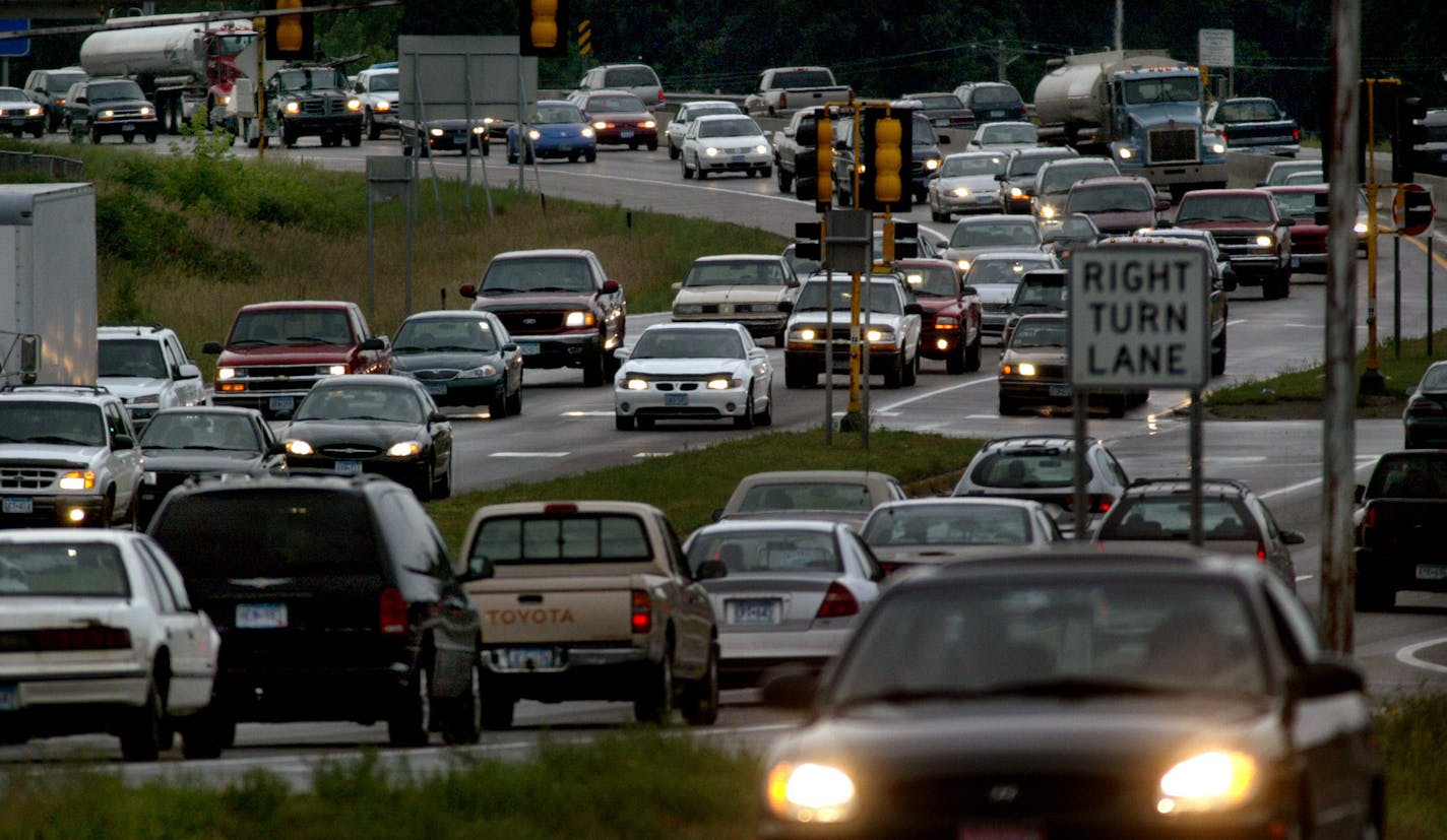 Jim Gehrz/Minneapolis Star Tribune Traffic slows to a crawl along Highway 10 in Anoka during the afternoon commute. This scene shows traffic on Highway 10 (west bound lane is at left) near Main St. ORG XMIT: MIN2016092911564134