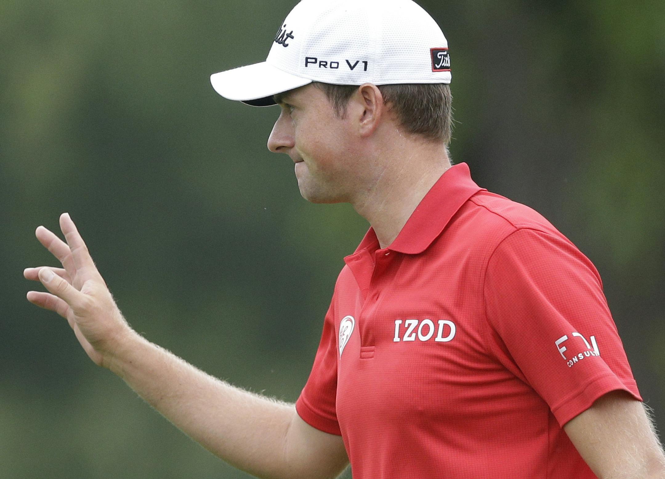 Webb Simpson celebrates after a birdie on the sixth hole during the second round of the PGA Championship golf tournament at Oak Hill Country Club, Friday, Aug. 9, 2013, in Pittsford, N.Y. (AP Photo/Patrick Semansky)