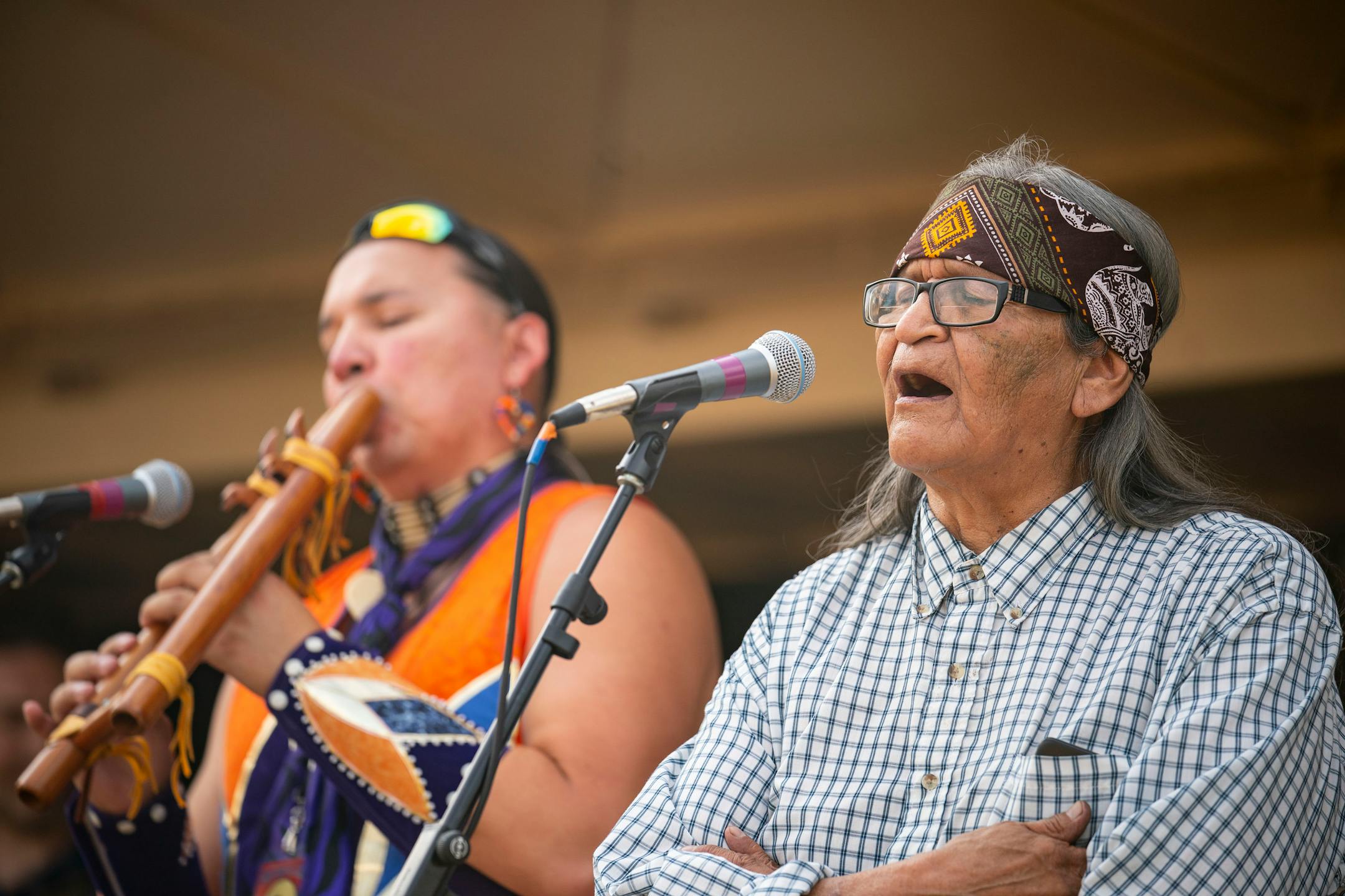 Musicians including Quiltman, right, performed on the side stage at the Water Is Life Festival on Wednesday.