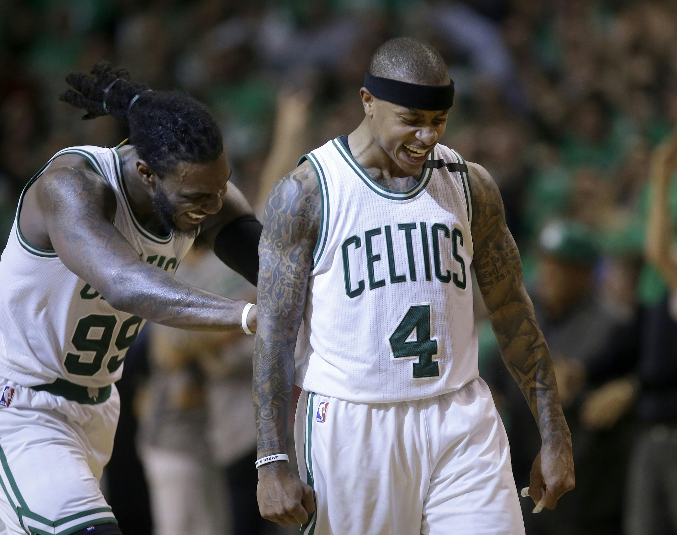 Boston Celtics guard Isaiah Thomas (4) celebrates his basket with Jae Crowder, left, during the fourth quarter of Game 7 of a second-round NBA basketball playoff series against the Washington Wizards, Monday, May 15, 2017, in Boston. (AP Photo/Charles Krupa)