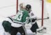 Dallas Stars Ales Hemsky (83) shoots the puck past Minnesota Wild goalie Darcy Kuemper (35) for a goal as forward Mikko Koivu (9) attempts to defend i