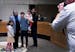 Lori Saroya poses for a photo with family after being sworn in as the Ward 1 City Council Member Wednesday, January 4, 2023, in Blaine, Minn. ] CARLOS