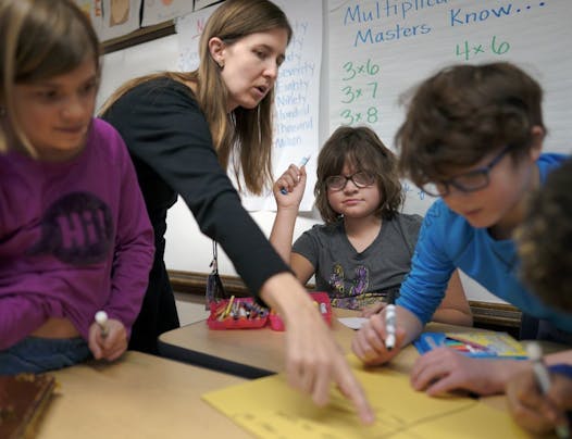 Fourth-grade teacher Lisa Petras worked with Sophia at Howe School in Minneapolis. The federal government pays for about 8 percent of Minnesota's $2.2 billion special education expenses, a gap that is pushing districts to make big cuts elsewhere.