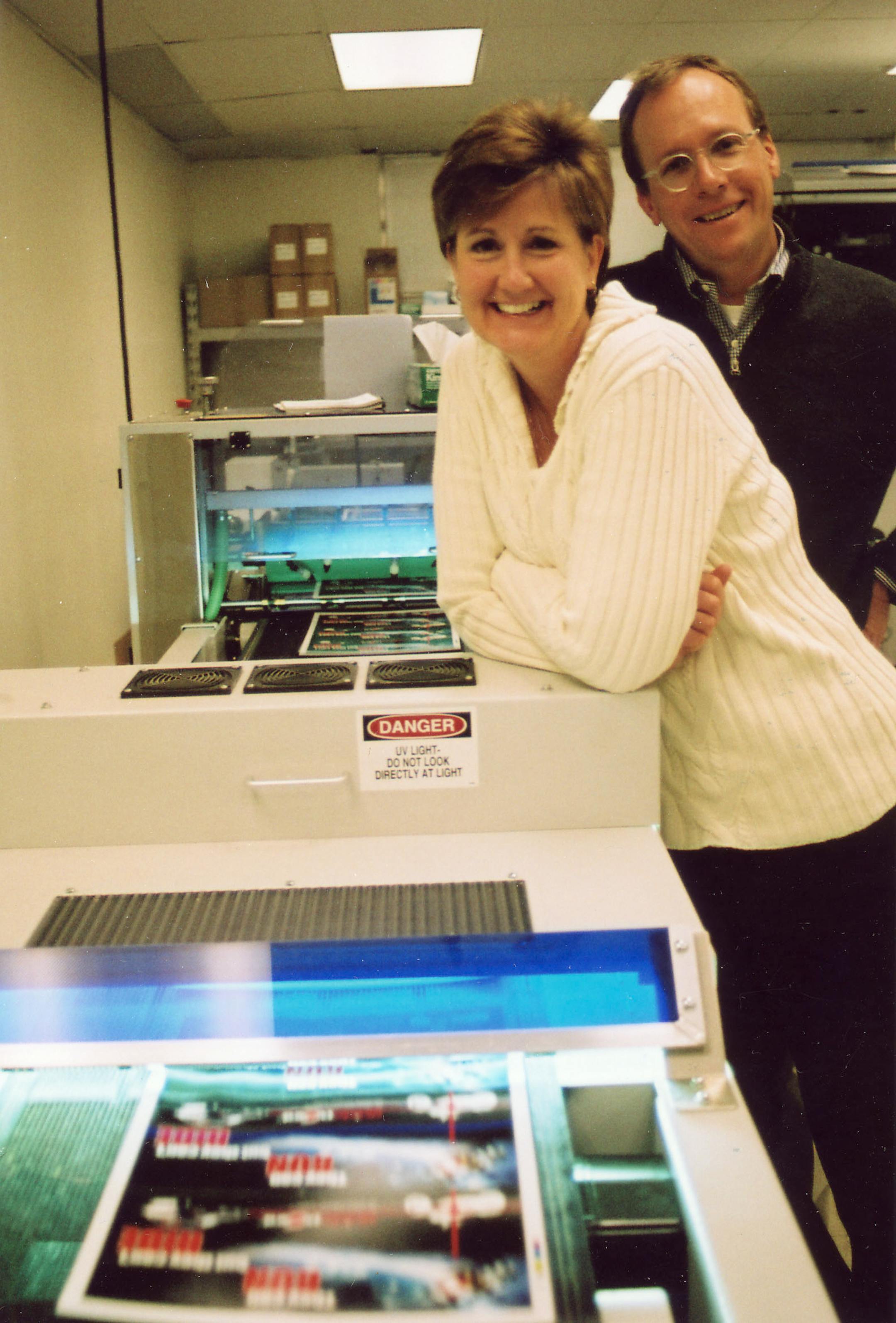 Phlayne Anderson and Kurt Johnson are co-founders of a company that helps clients design promotional postcards.