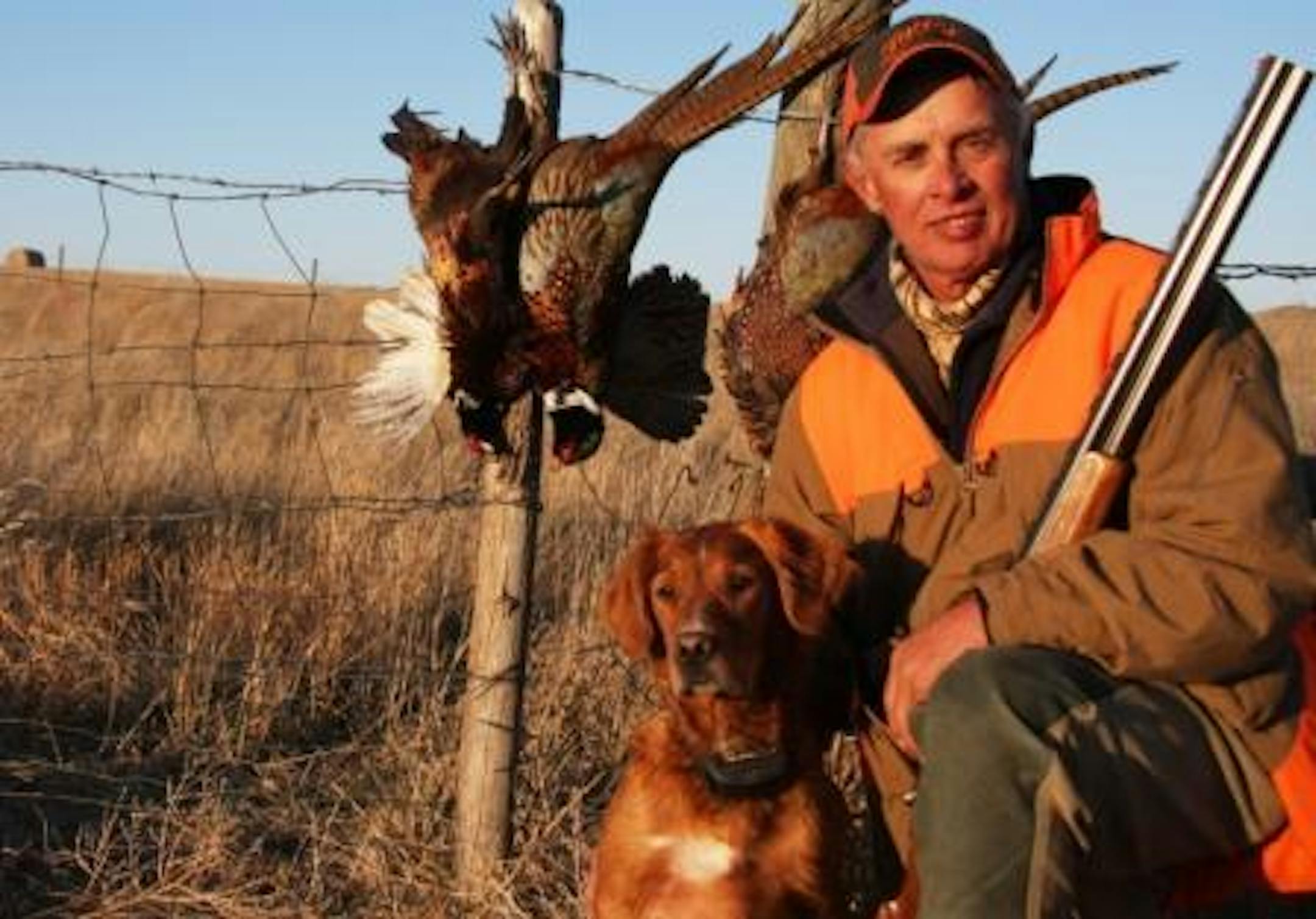 Some extra work to set up this shot of "The Captain" Billy Hildebrand and Tess paid off. Photo by Anthony Hauck / Pheasants Forever