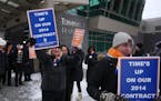 Sun Country flight attendants picketed for a better contract in snowy conditions Feb. 22 at Minneapolis-St. Paul International Airport’s Terminal 2.