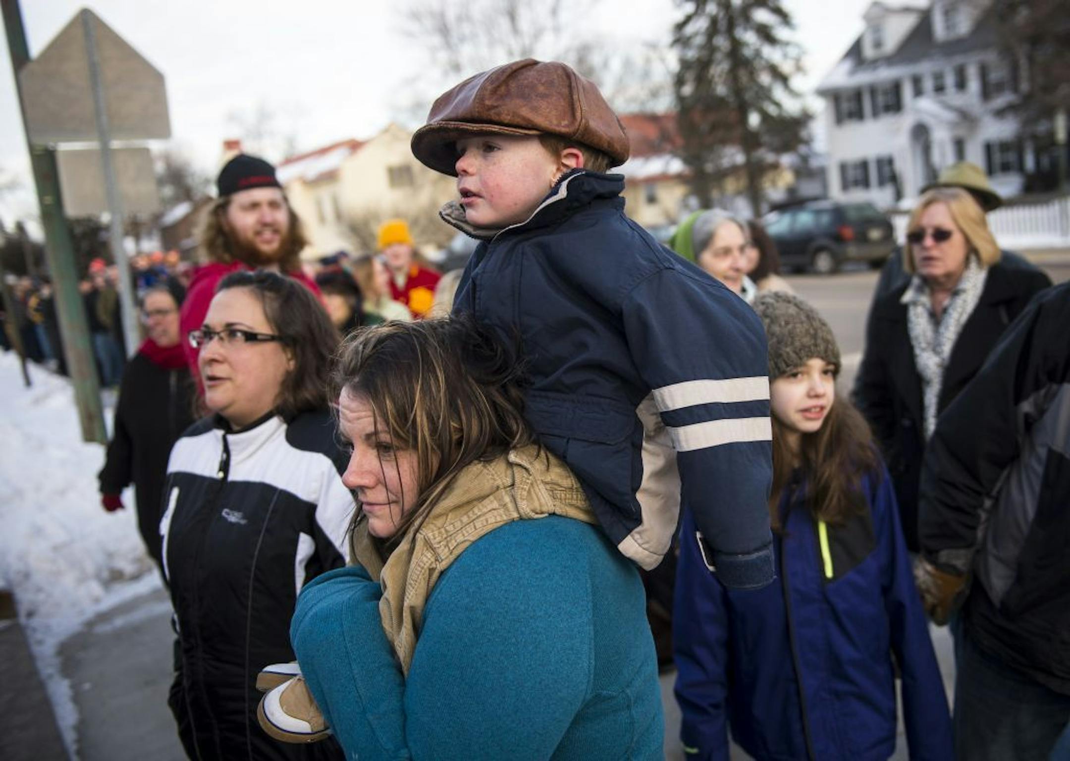 Bernie Sanders supporter Emma Tufts, of Nevis, and her son James, 4, waited in line outside Hibbing High School Friday morning.