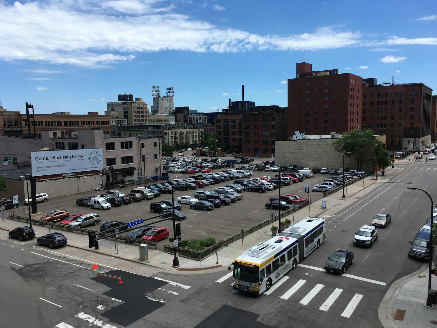 Sherman Associates wants to remake this block on the east side of downtown Minneapolis with a 22-story apartment tower and other businesses. A retail complex with the Crooked Pint bar and grill is visible on the left, and Minneapolis Fire Station No. 1, which might be remade in the deal, is on the right.