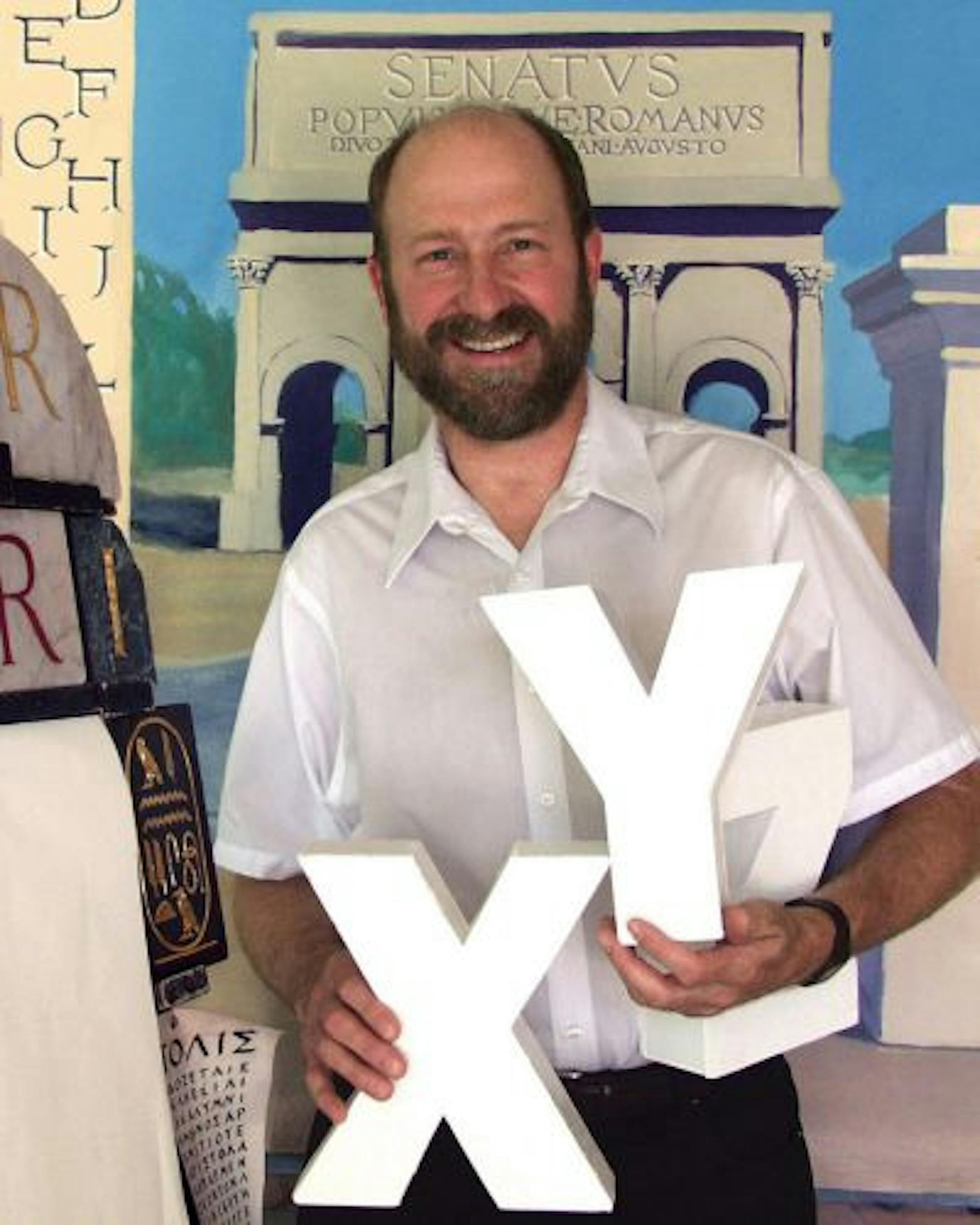 Scott Cleland worked in schools across the state as an artist in
residence with his program "The Alphabet Adventure."