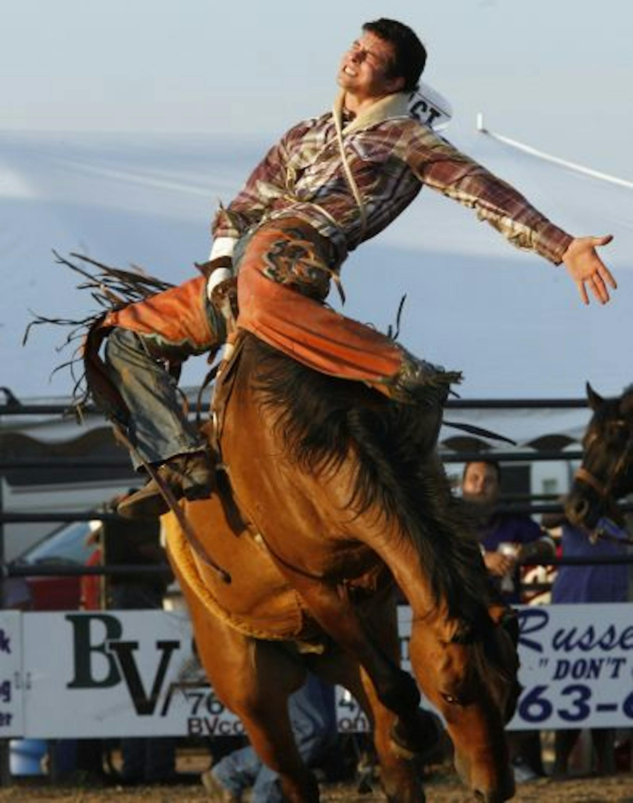 Josh Reuter of Potosi WI held on in the bareback horse riding event.