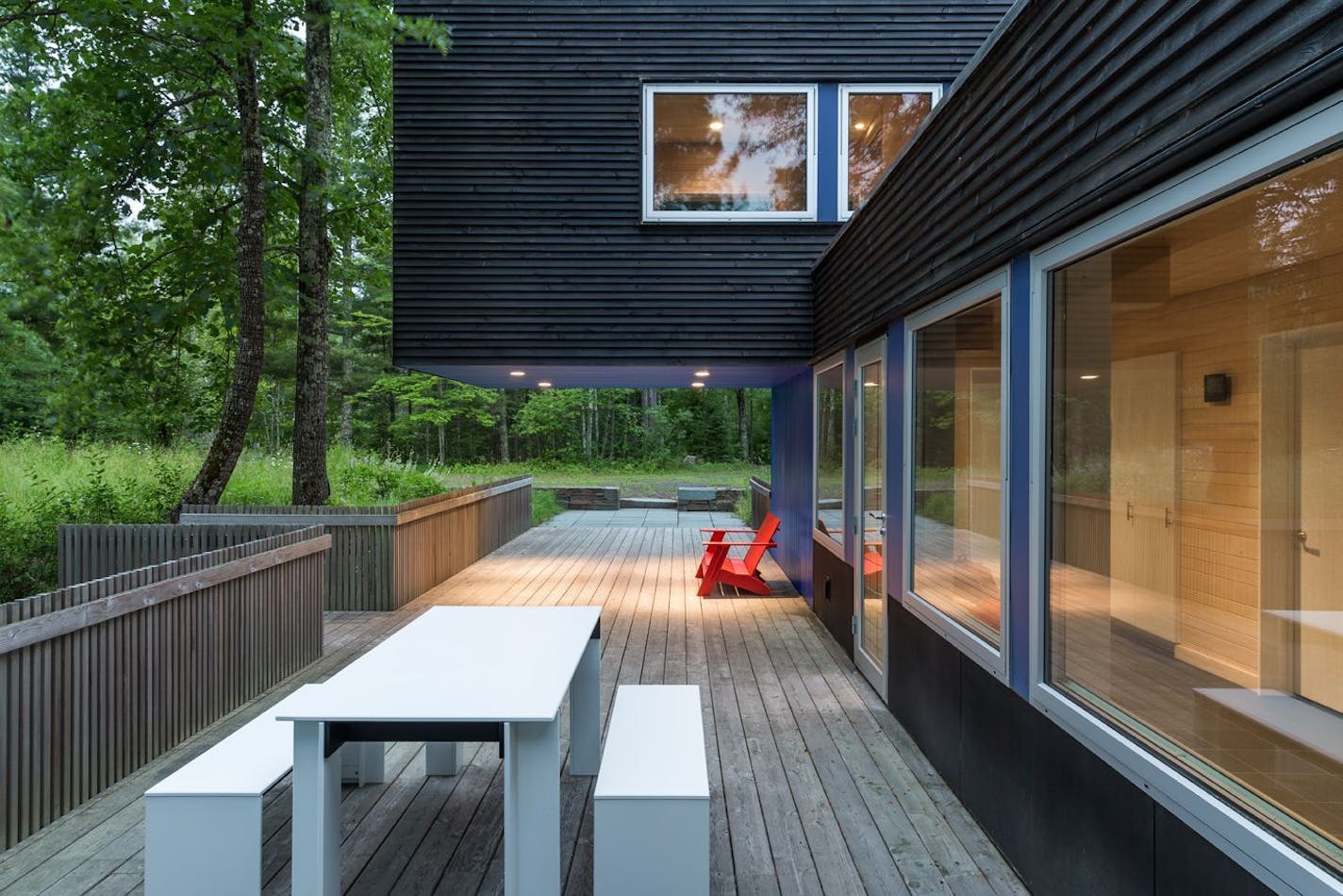 Home of the Month -Northern Minnesota unique retreat composed of cantilevered boxes clad in basswood clean-lined interiors, designed by David Salmela.