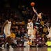 Caleb Williams (32) shot over former Gophers guard Elijah Hawkins (0) during an exhibition game in November. Williams scored 41 points against the Gop