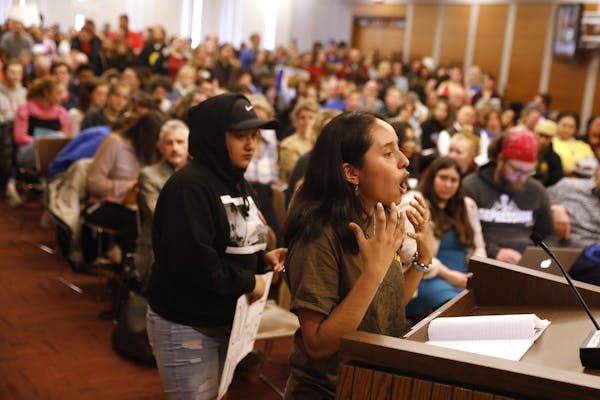 Ashley Ortega-Cano, a freshman at Southwest High School, speaks during the public comment period about potential cuts to a Chicano Latino cultural stu