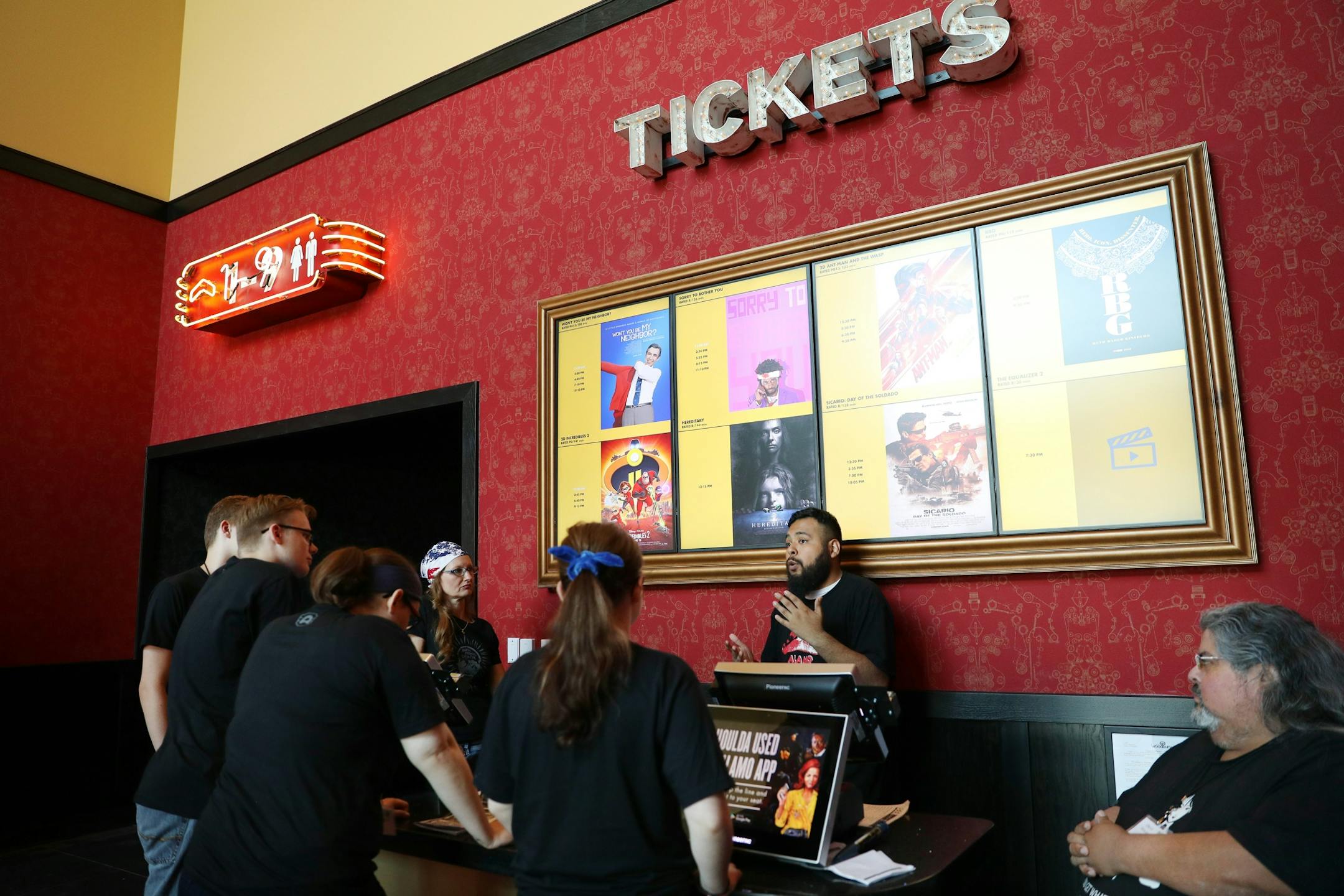 New hires took part in a training session in the lobby at Alamo Drafthouse Cinema.