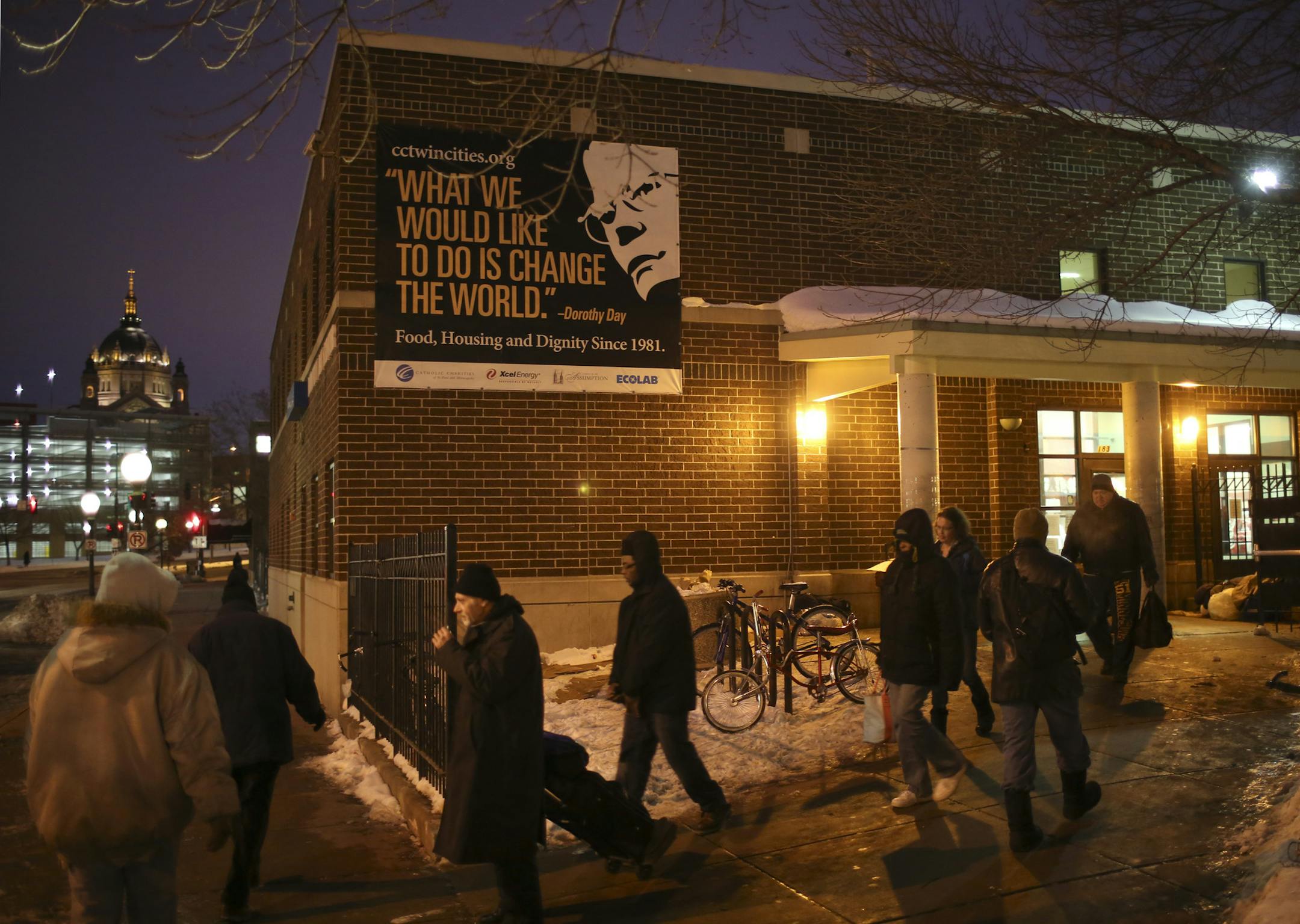 A task force to rethink the Dorothy Day Center in downtown St. Paul is recommending a $64 million project that would locate a shelter and opportunity center in the northeast corner of downtown and build permanent housing on the current site near the Xcel Energy Center. The outside of the Dorothy Day Center in downtown St. Paul Thursday evening, December 19, 2013. Clients were departing after receiving an evening meal. Many would return two hours later when the shelter opened for overnight client
