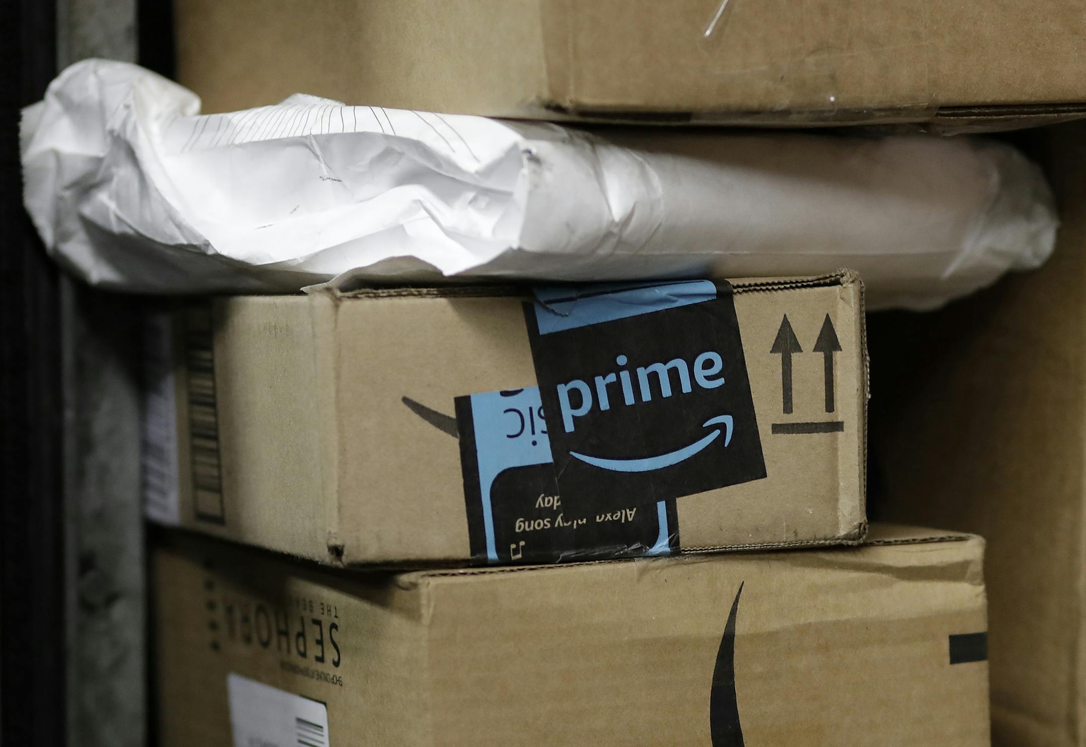 In this Tuesday, May 9, 2017, photo, a package from Amazon Prime is loaded for delivery on a UPS truck, in New York. Amazon is extending its annual ìPrime Dayî promotion to 30 hours this year. Amazon will offer discounts and other deals in an effort to boost sales during the slower summer months. This yearís Prime Day will start at 9 p.m. ET on July 10, 2017. While Amazon has claimed success, there have been grumblings that Prime Day deals have been unimpressive or involve older m