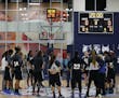 A backdrop of bright windows surrounded Lynx players Sunday as they huddled for instructions during a break in the WNBA team&#x2019;s first training c