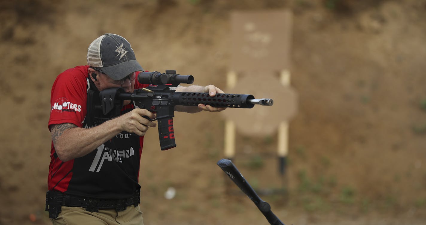 Mark Stevens fired his AR-15 at targets during 3 gun league shooting at the Forest Lake Sportsmen's Club Wednesday night. ] JEFF WHEELER &#x2022; jeff.wheeler@startribune.com The Forest Lake Sportsmen's Club runs a league for a relatively new discipline of competitive shooting known as 3 gun. Participants solve a variety of target problems with either a pistol, shotgun, or rifle. The league competition was Wednesday night, June 15, 2016 in Forest Lake. ORG XMIT: MIN1606161405150636