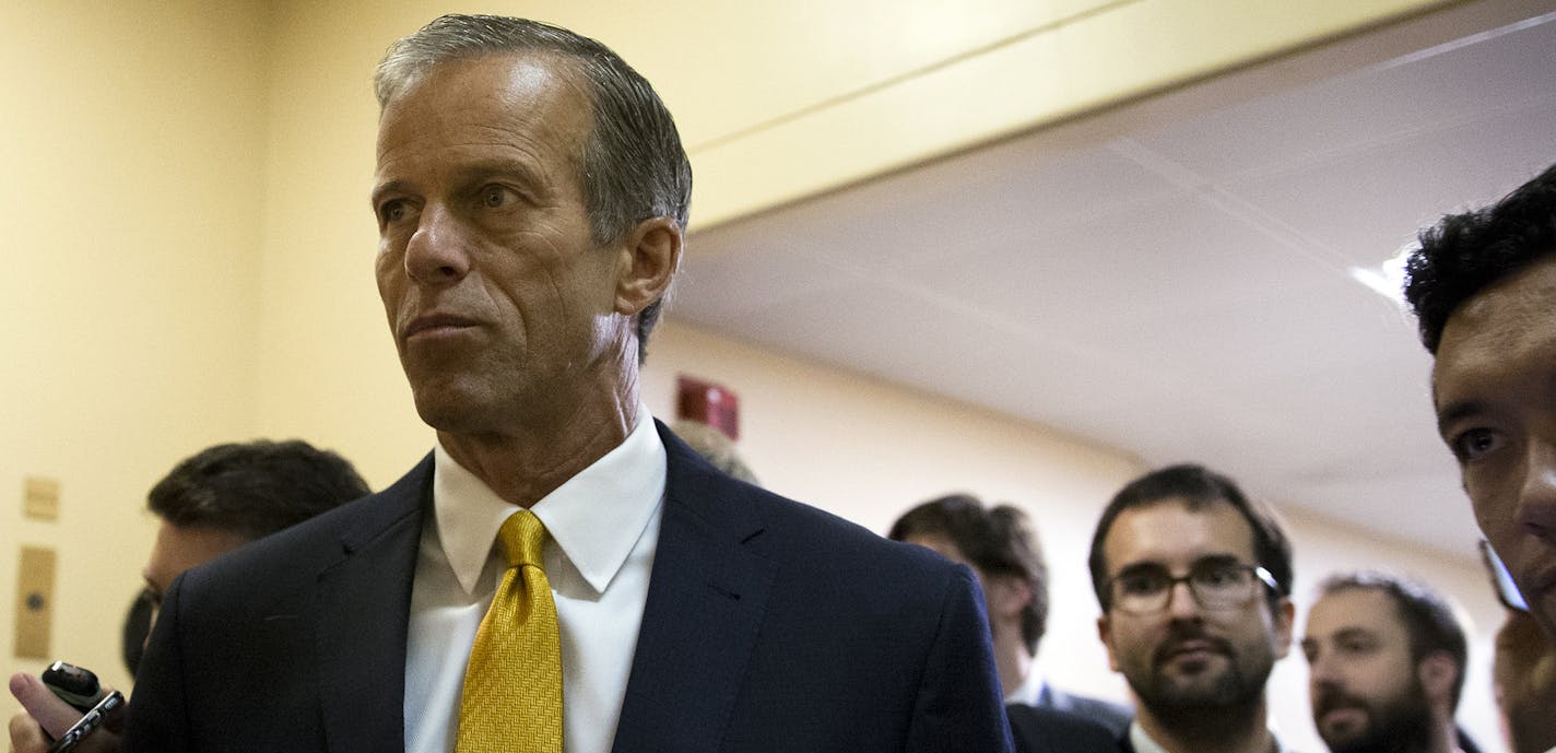 Sen. John Thune (R-S.D.) heads to the Senate floor for a vote on health care legislation, on Capitol Hill in Washington, July 26, 2017. Seven Republicans rejected a measure repealing major parts of the Affordable Care Act without replacement on Wednesday; the 45-55 defeat signaled that a &#xec;clean repeal&#xee; bill cannot get through Congress. (Tom Brenner/The New York Times) ORG XMIT: MIN2017080414025217