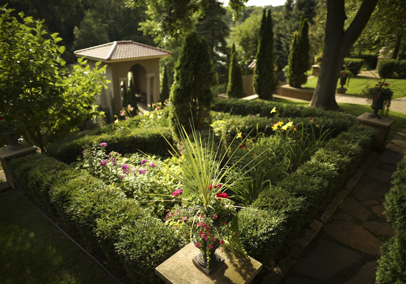 A parterre, or knot garden, in the terraced backyard of the Edina home of Brian Ellingson and Gary Domann.