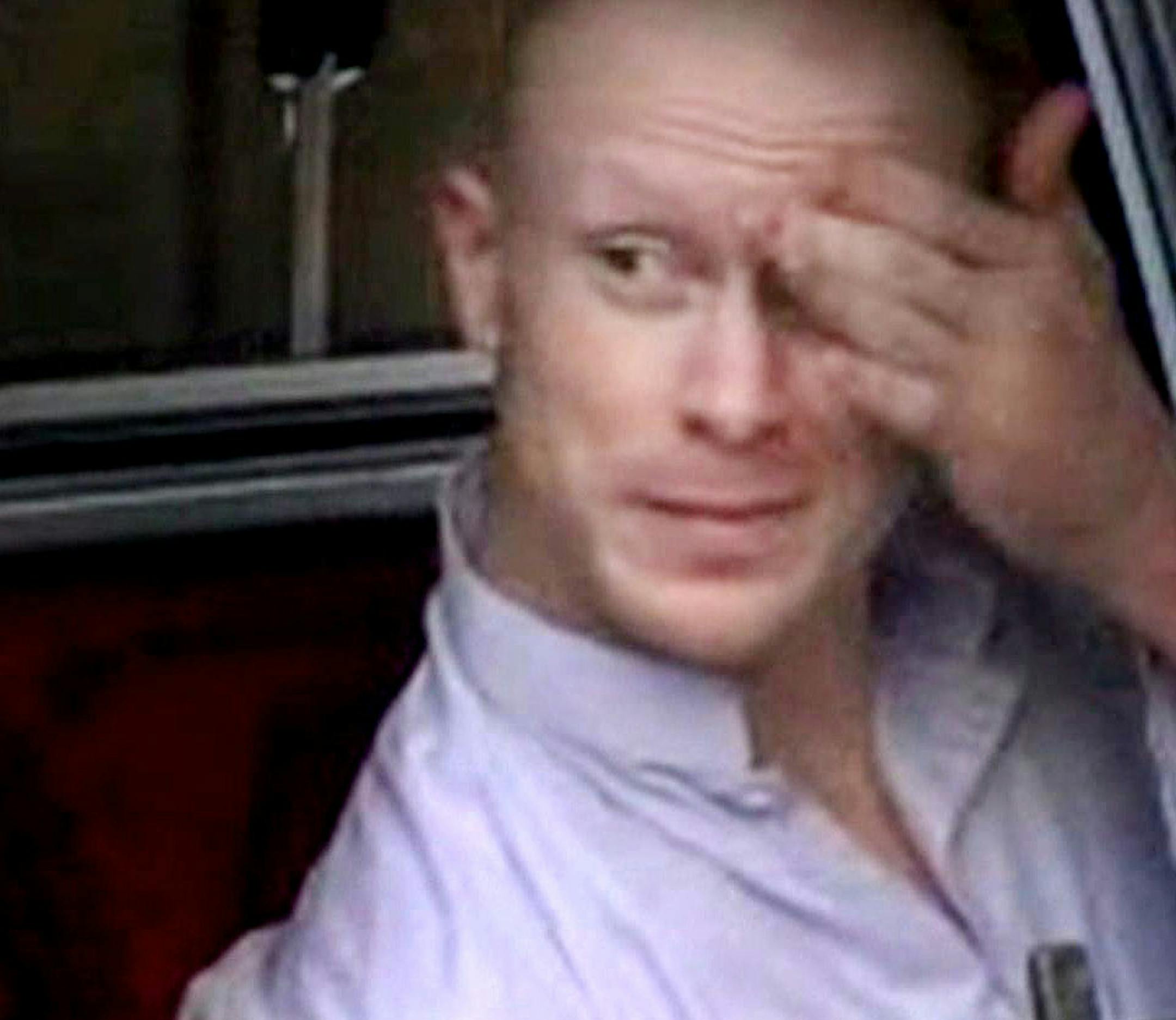 Sgt. Bowe Bergdahl, sits in a vehicle guarded by the Taliban in eastern Afghanistan.