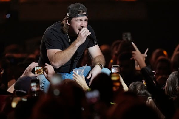 Morgan Wallen performs on the first night of the 2022 iHeartRadio Music Festival, Friday, Sept. 23, 2022, in Las Vegas. (AP Photo/John Locher)