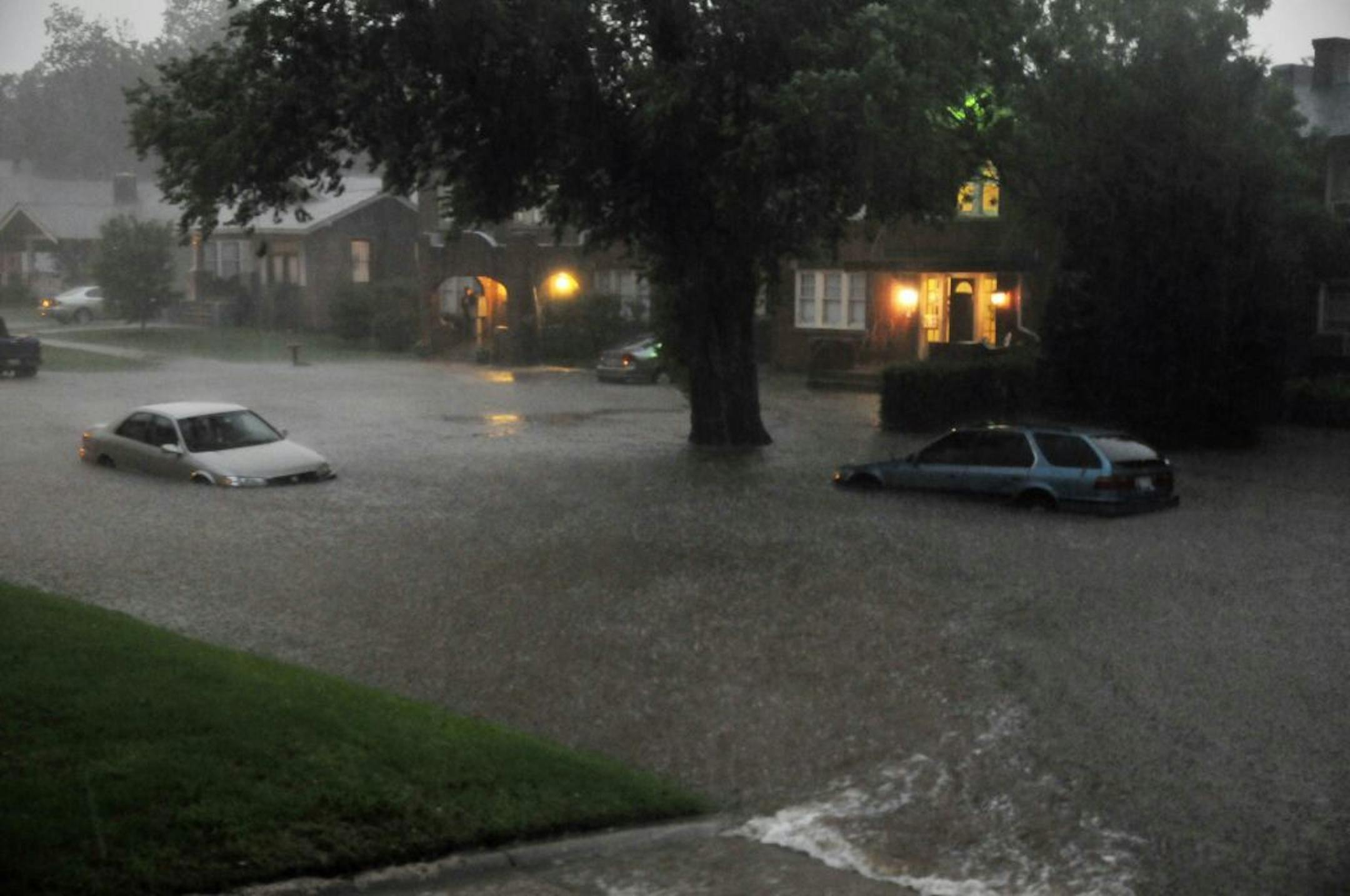Parts of Oklahoma City experience extreme flooding after multiple tornado's passed through Central Okla. on Friday May 31, 2013 in Oklahoma City. A violent storm formed over the prairie west of Oklahoma City late Friday afternoon, dropped a tornado in a suburb and rolled into the state capital as viewers brave enough to remain above ground watched on statewide television.