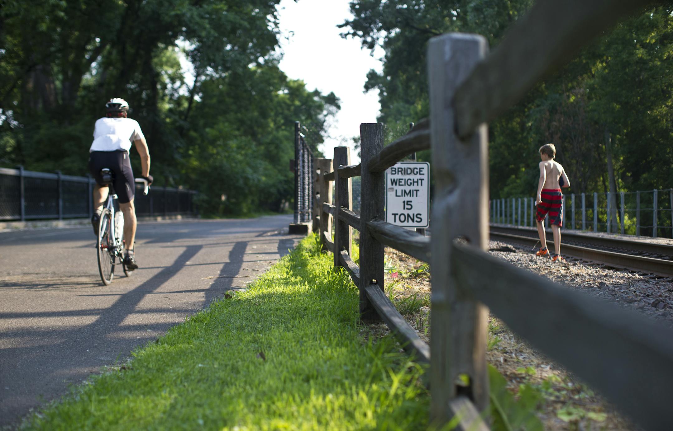 The Cedar Lake Trail alongside a current freight train track that has been a proposal sight for the Southwest Corridor light rail line in St. Louis Park, Minn.