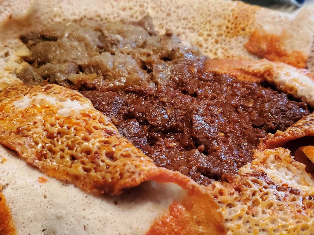 Beef alecha wot and beef key wot from Agelgil Ethiopian Restaurant in St. Paul.